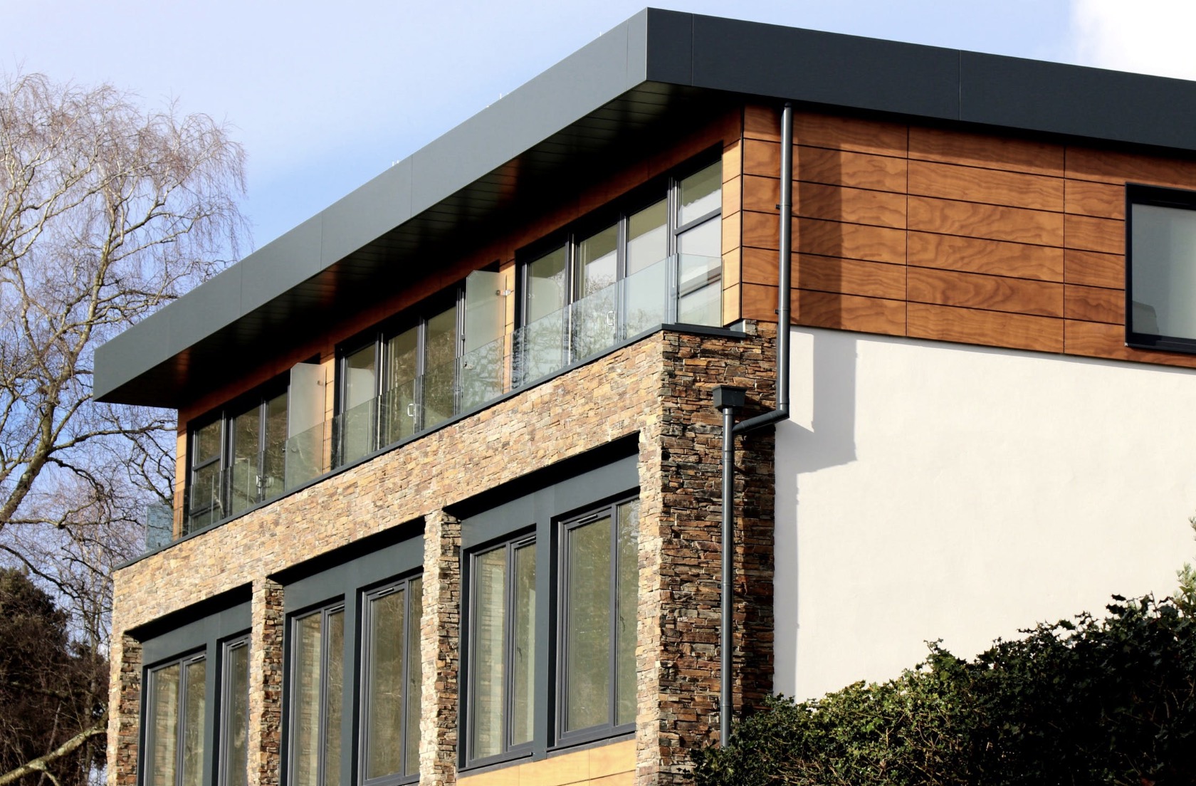 stone house with flat roof