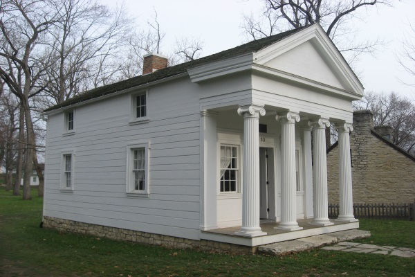 elegant vinyl siding on a medium-sized colonial-style property