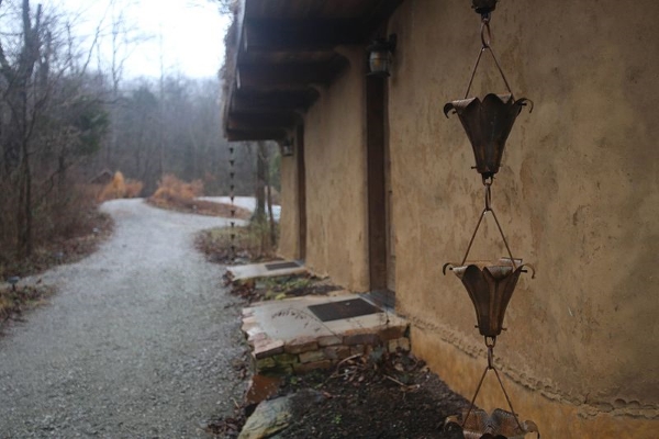 a rain chain of stylish metal leave cups