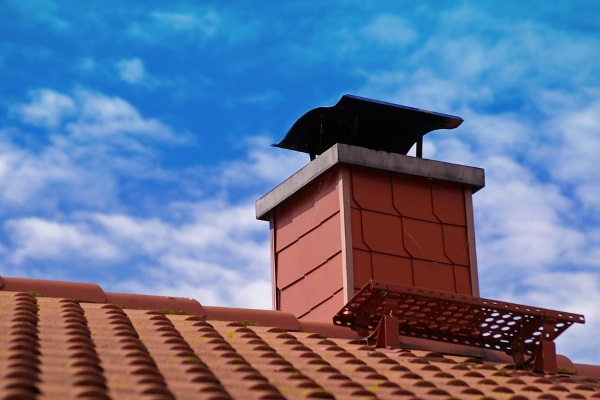 a chimney with roof flashing